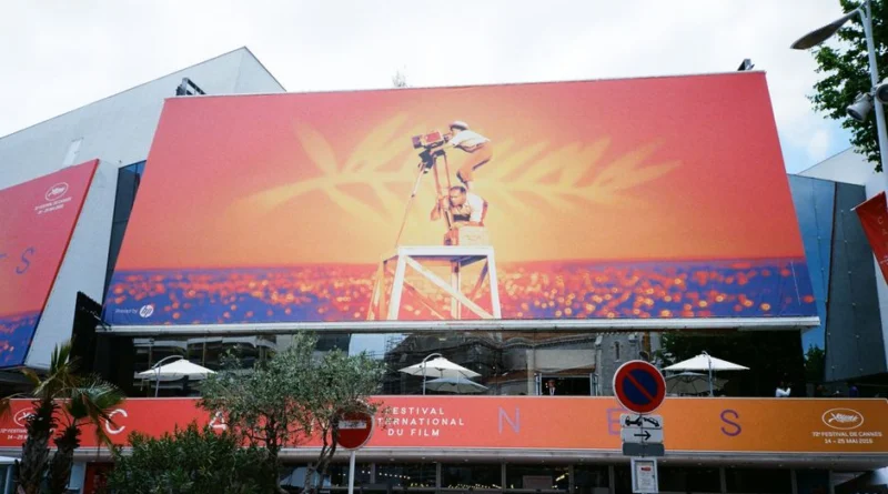 Large billboard at the Cannes Film Festival showcasing vibrant imagery.